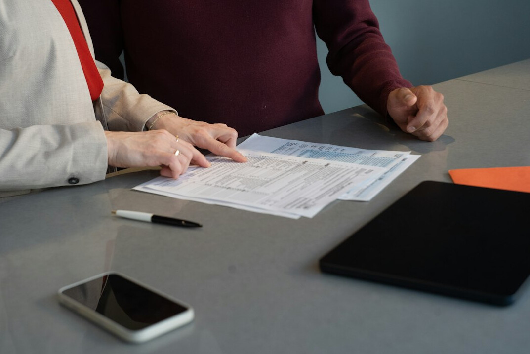 insurance advisor with client