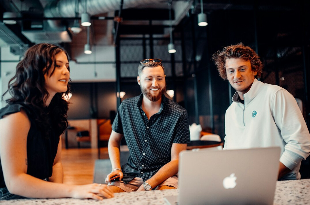 team discussing ai strategy